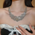 Silver Crystal Bib Necklace Set Matching Teardrop Earrings view 3