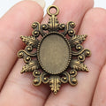 Ornate Oval 13 x 18 mm Pendant Settings in Two Finishes view 1