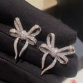 Pave Ribbon Bow Statement Stud Earrings Silver Tone view 1