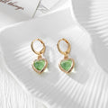 Gold Tone Faceted Crystal Heart Huggie Earrings in Eleven Color Options view 7