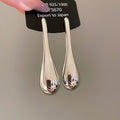 Long Teardrop Stud Earrings in Gold and Silver Tones view 7