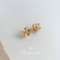 Gold Five Petal Flower Huggie Earrings Clear Center Stone view 6