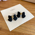 Black Bow Stud Earrings With Gold-Tone Centers - One Style view 6