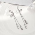 Silver Tone Bow and Double Long Chain Tassel Earrings view 2