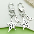 Celestial Charm Keychains Featuring Star Moon Clip Across 15 Pictured Variations view 1