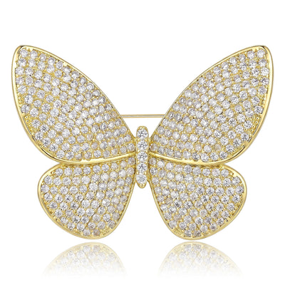 Front view of pave crystal butterfly brooch with four rounded stone-set wings against a white background.