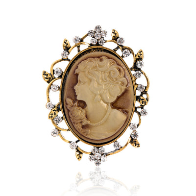 Front product view of the woman portrait brooch pin in gold and silver