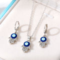 Silver Tone Crystal Hamsa Evil Eye Necklace and Huggie Earrings view 1