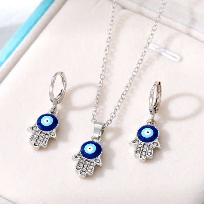 Silver Tone Crystal Hamsa Evil Eye Necklace and Huggie Earrings