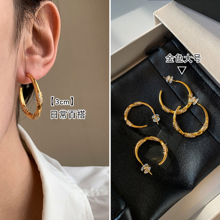 Crystal C Hoop Earrings In Gold And Silver Tone Finishes