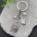 Two Silver Tone Turtle Family Keychain Designs with Metal Hardware view 7