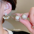 Gold Tone Pearl and Crystal Floral Drop Stud Earrings view 1