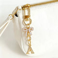 Gold Tone Initial Letter Bag Charm with Pastel Enamel Bow view 6