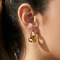 Rounded Triangle U Hoop Earrings in Gold and Silver Tone view 1