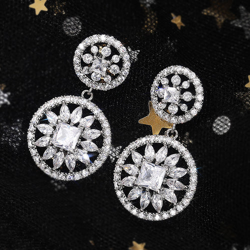 Double Round Floral Clear Stone Earrings Metal Jewelry Design shown in a front close-up