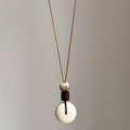 Brown Cord White Bi Disc Pendant Necklace Wood Lotus Bead view 2
