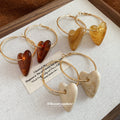 Gold Tone Hoop Earrings with Resin Heart Drops in Three Colors view 2