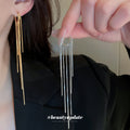 Long Chain Tassel Huggie Earrings in Silver and Gold Tones view 2