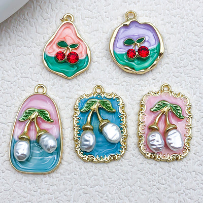 Colorful cherry charms arranged on a light background