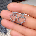 Silver Tone Crystal Heart Bow Stud Earrings with Polished Finish view 2