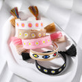 Wide Woven Daisy and Evil Eye Adjustable Tassel Bracelets view 2