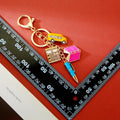 Mini Office Charm Keychain With Book, Pen, Briefcase and Taxi view 3