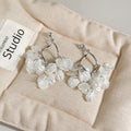 White Translucent Petal Cluster Silver Tone Hoop Earrings view 2