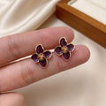 Burgundy Four Petal Flower Gold Tone Stud Earrings view 6