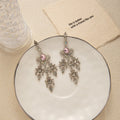 Pink Center Ornate Silver Tone Chandelier Stud Earrings view 2