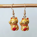 White and Gold Lucky Cat Drop Earrings with Fishhook Ear Wires view 5