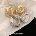 Sculptural Open Oval Stud Earrings in Gold and Silver Tones view 3