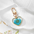 Gold Tone Pressed Flower Daisy Heart Snap-Hook Keychains in Ten Options view 3