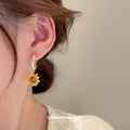 Orange Sunflower Drop Earrings With Crystal Hooks With Polished Metal Tone Details view 3