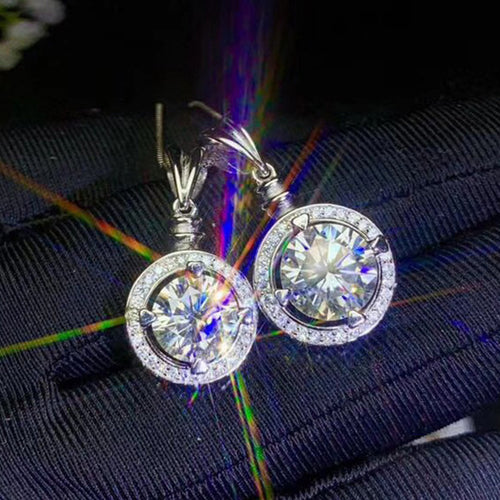Silver Tone round halo pendant shown in alternate close-up view