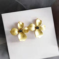 Gold Matte Four-Petal Flower Stud Earrings Dark Crystal Center view 2