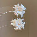 White Floral Stud and Pearl Drop Earrings in Two Styles view 6