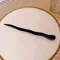 Black Curved Hair Stick With Tapered Point And Wide Handle view 2