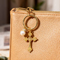 Gold Tone Ornate Cross and Pearl Keychain and Attached Hardware view 3