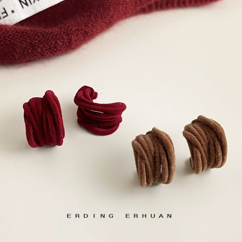 Wine and brown flocked geometric hoops side by side