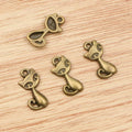 Sitting Cat Metal Charms with Cutout Details in Two Finishes view 3