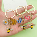 Bee and Honeycomb Charm Keychains Featuring Flower Across 47 Pictured Variations view 2