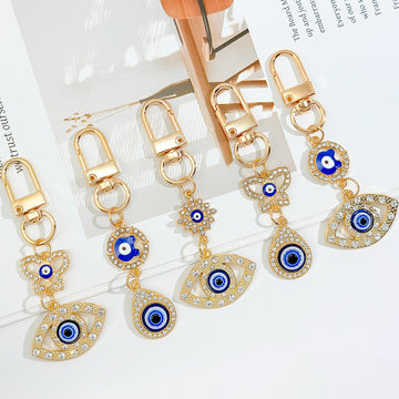 Gold Crystal Evil Eye Keychain With Butterfly And Bear Charm