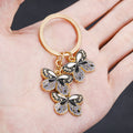 Black Butterfly Enamel Charm Keychain with Gold Tone Hardware view 4