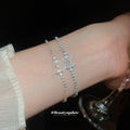 Crystal Pave Bow Tennis Bracelets Silver and Gold Tone view 1