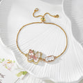 Gold Tone Pressed Flower Butterfly Slider Bracelets in Six Designs view 6