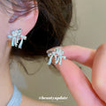 Crystal Bow Stud Earrings in Two Colors With Silver-Tone Settings view 3