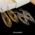 Nested Oval Wire Drop Hook Earrings In Gold And Silver view 3