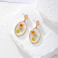 Oval Gold Rim Resin Dried Flower Stud Earrings 8 Colors view 4