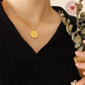 Gold Steel Engraved Geometric Cross Disc Pendant Necklace view 3