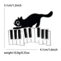 Enamel Cat on Piano Keyboard Brooch Black and White view 7